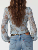 Marina · Blusa fruncida con cremallera dorada
