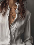 Ana · Blusa Blanca Cremallera con Volantes