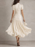 ADRIANA | Vestido midi satinado a rayas retro