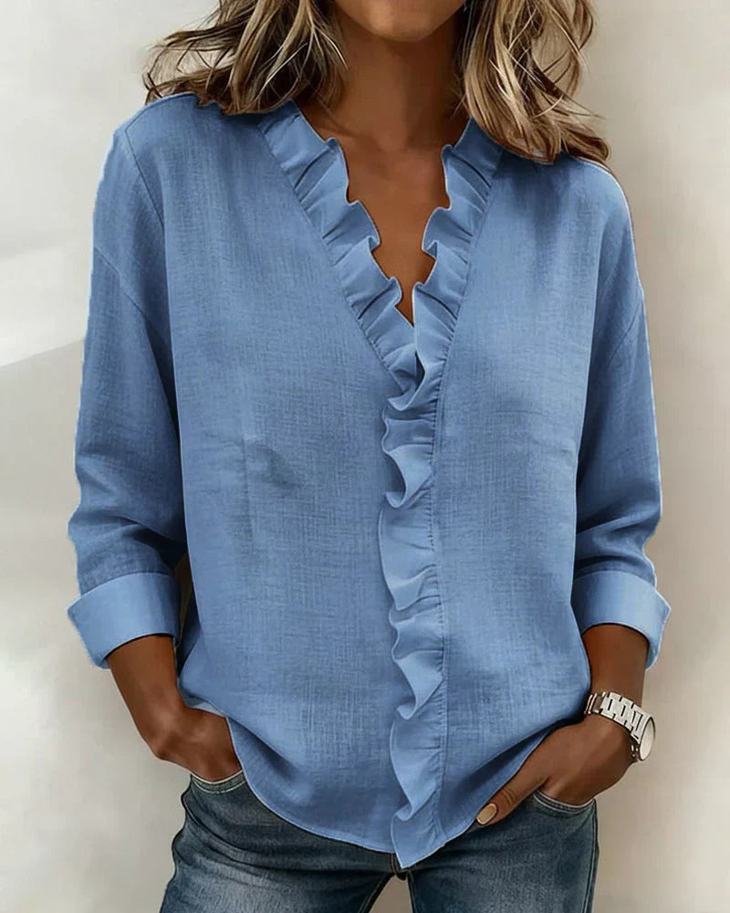 Indie · Blusa con volantes y cuello en V